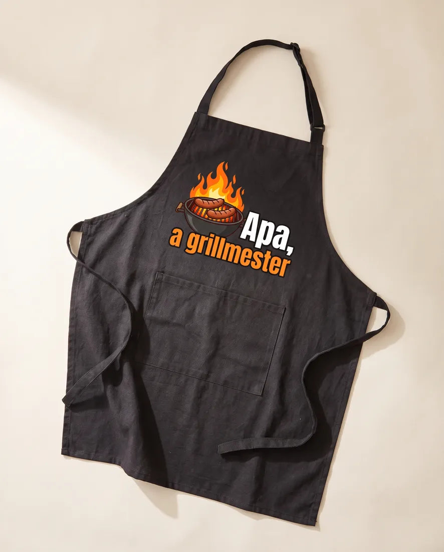 Fekete kötény grillel és „Apa, a grillmester” felirattal